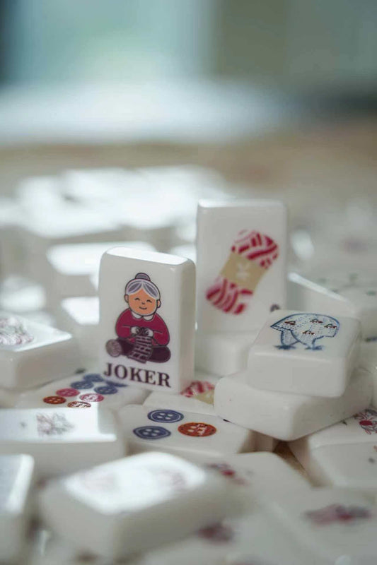 Cute American Mahjong Set - joker tiles and number tiles close up on marble surface