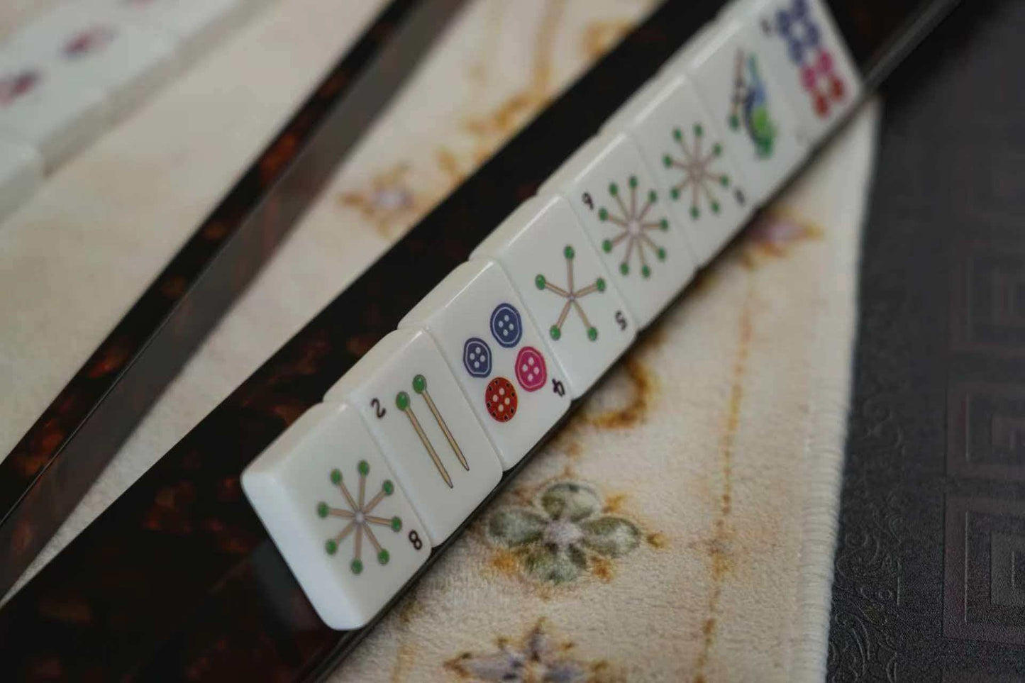 Cute American Mahjong Set - bam and dot suit tiles in rack side view