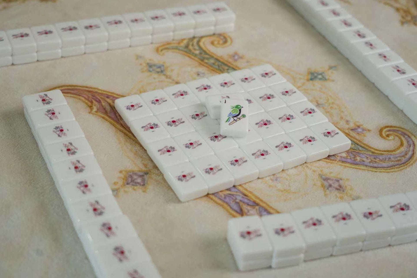 Cute American Mahjong Set - complete game setup with all four walls built on marble table