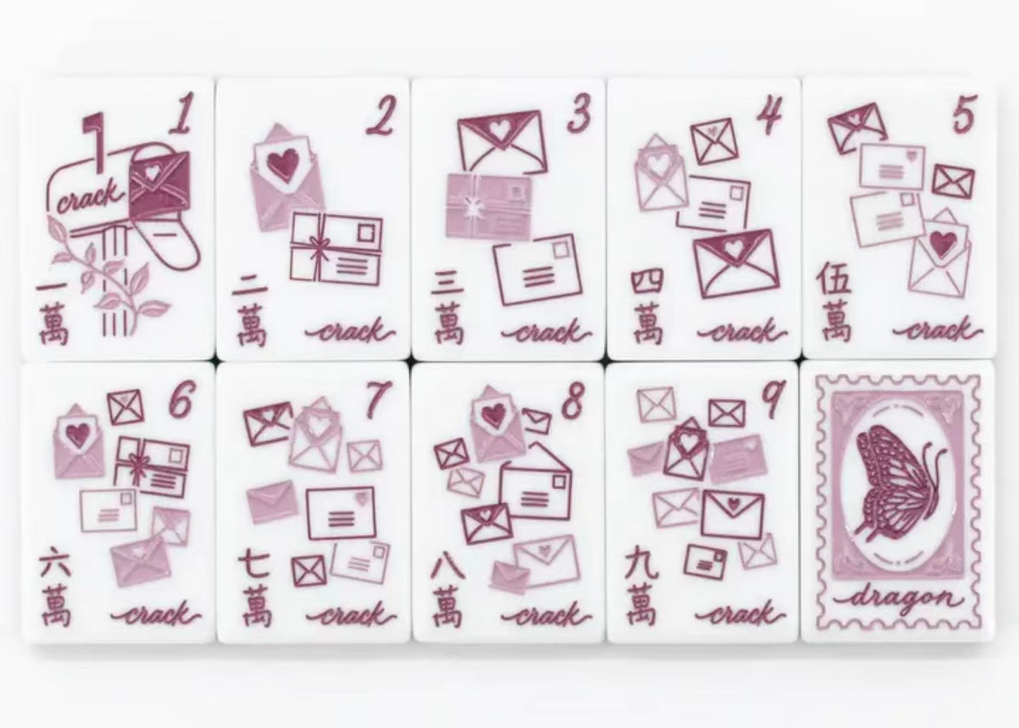 Floral Garden Mahjong Set - lifestyle flat lay with tiles scattered among pink peonies and pansy flowers with gold fountain pen
